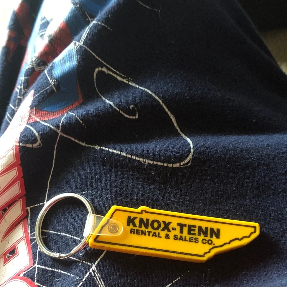 Yellow Logo Keychain on Navy Kids Bottoms